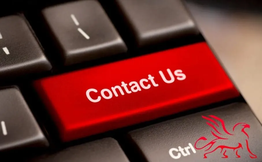 Red Contact Us key on a computer keyboard